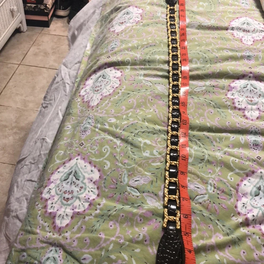 Gold and brown belt 35 inches to first hole. Size M